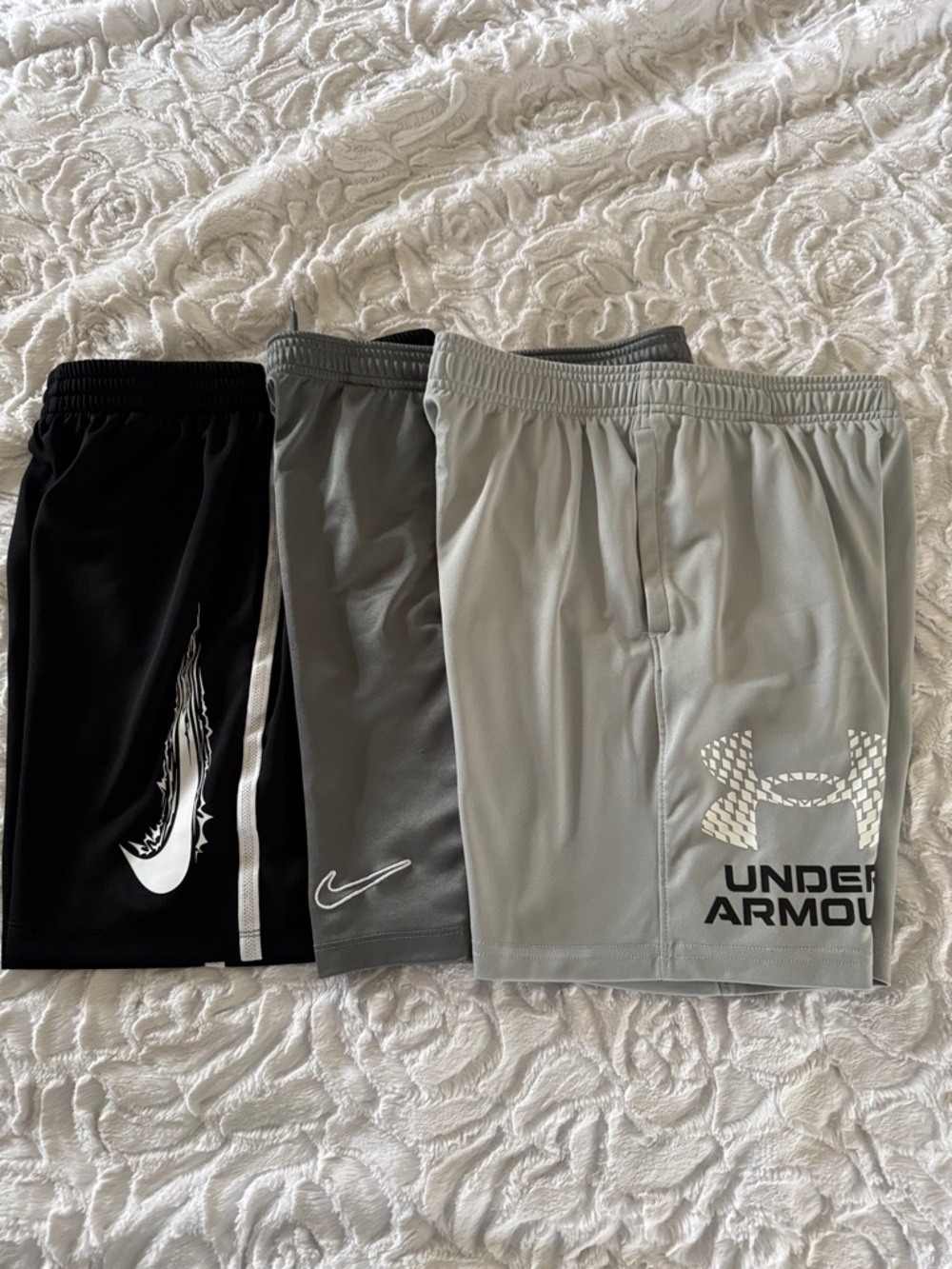 Boys Under Armour and Nike athletic shorts